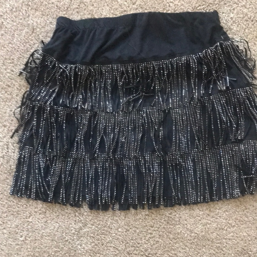 Short black skirt with rhinestone.